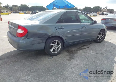 2002 Toyota Camry Xle z USA, uszkodzony, nr VIN 4T1BE32K02U616122